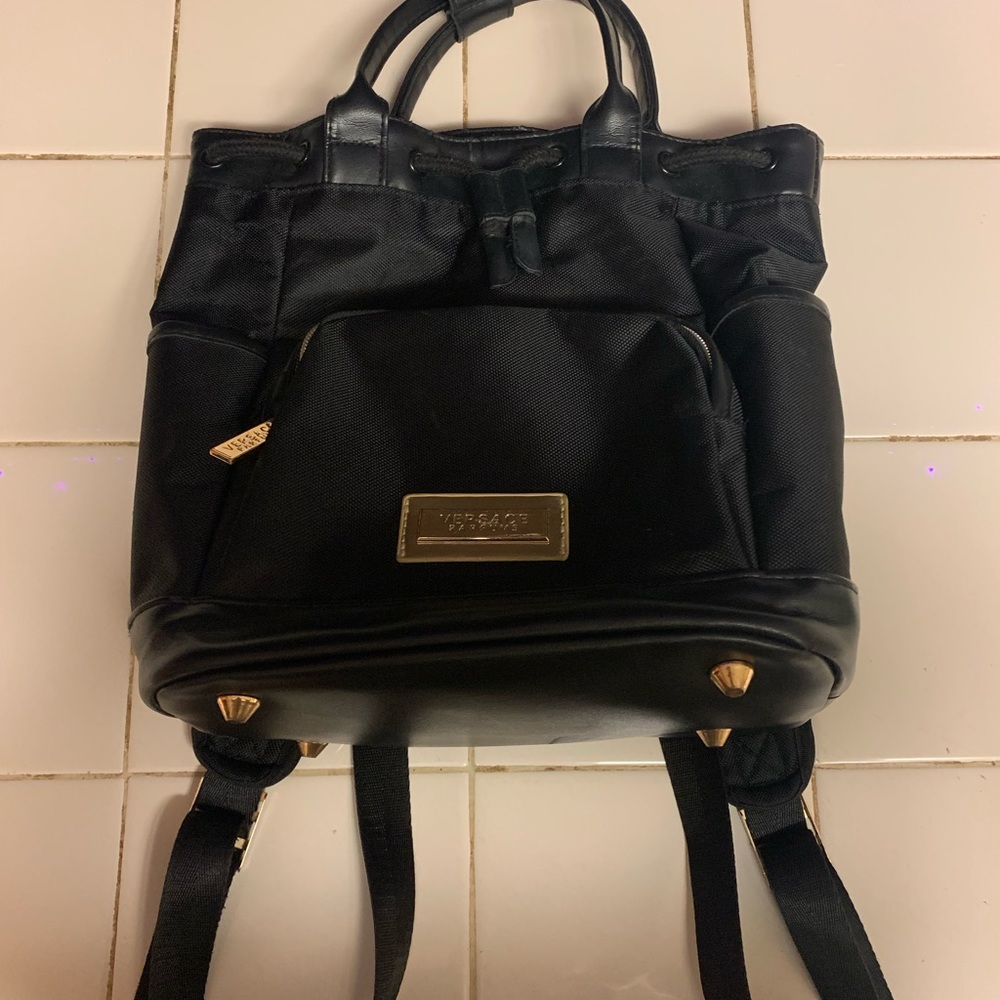 Versace Parfums Gold Black Backpack Style Bag- Used